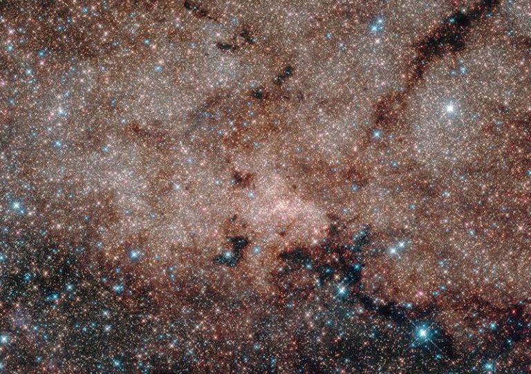 Središte Mliječne staze. Izvor: NASA, ESA, and Hubble Heritage Team (STScI/AURA, Acknowledgment: T. Do, A.Ghez (UCLA), V. Bajaj (STScI).