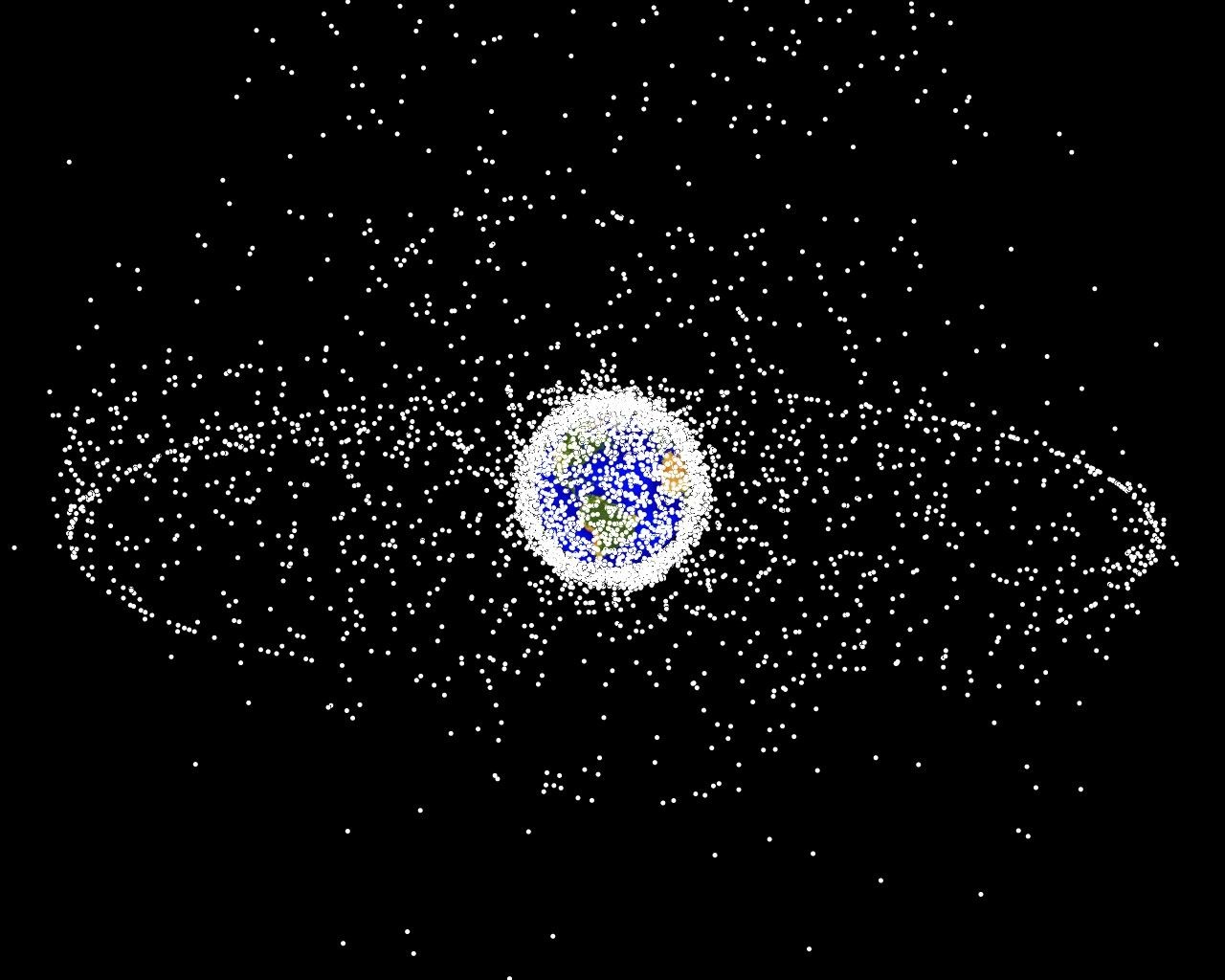 Računalno generirana slika objekata u Zemljinoj orbiti koji se trenutno prate. Ono što je alarmantno jest da otprilike 95% objekata na ovoj ilustraciji predstavljaju orbitalne krhotine, tj. satelite koji više nisu u funkciji te su stoga 'svemirski otpad' (©NASA).