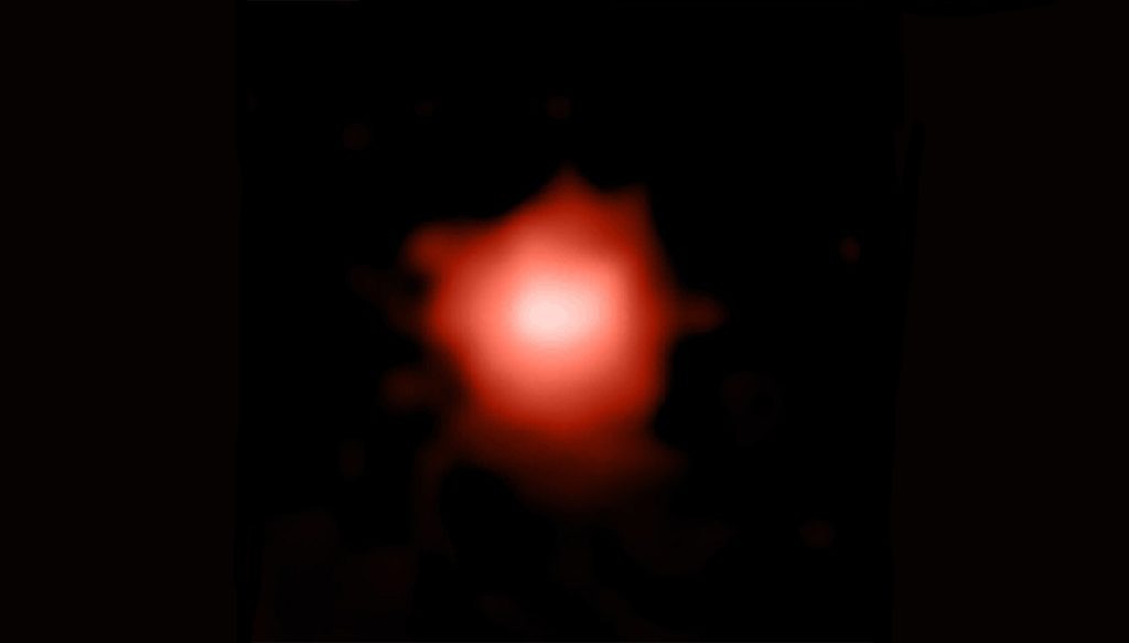 NASLOVNA Poznata kao GLASS-z13, galaksija datira 300 milijuna godina nakon Velikog praska, oko 100 milijuna godina 'mlađa' od prijašnjeg rekordera (©Naidu et al. 2022, NASA).
