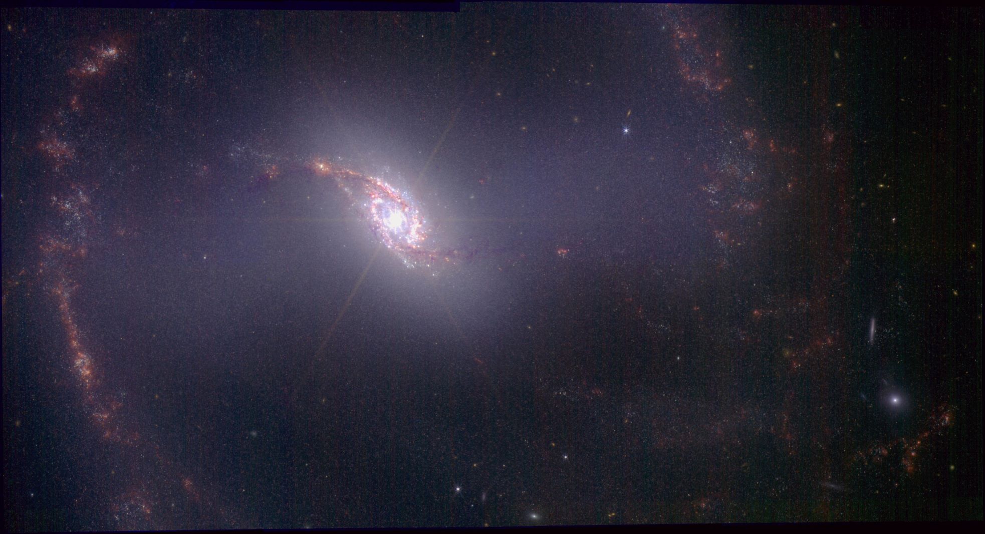 Obrađena slika galaksije sa spiralnim i prečkastim oblicima