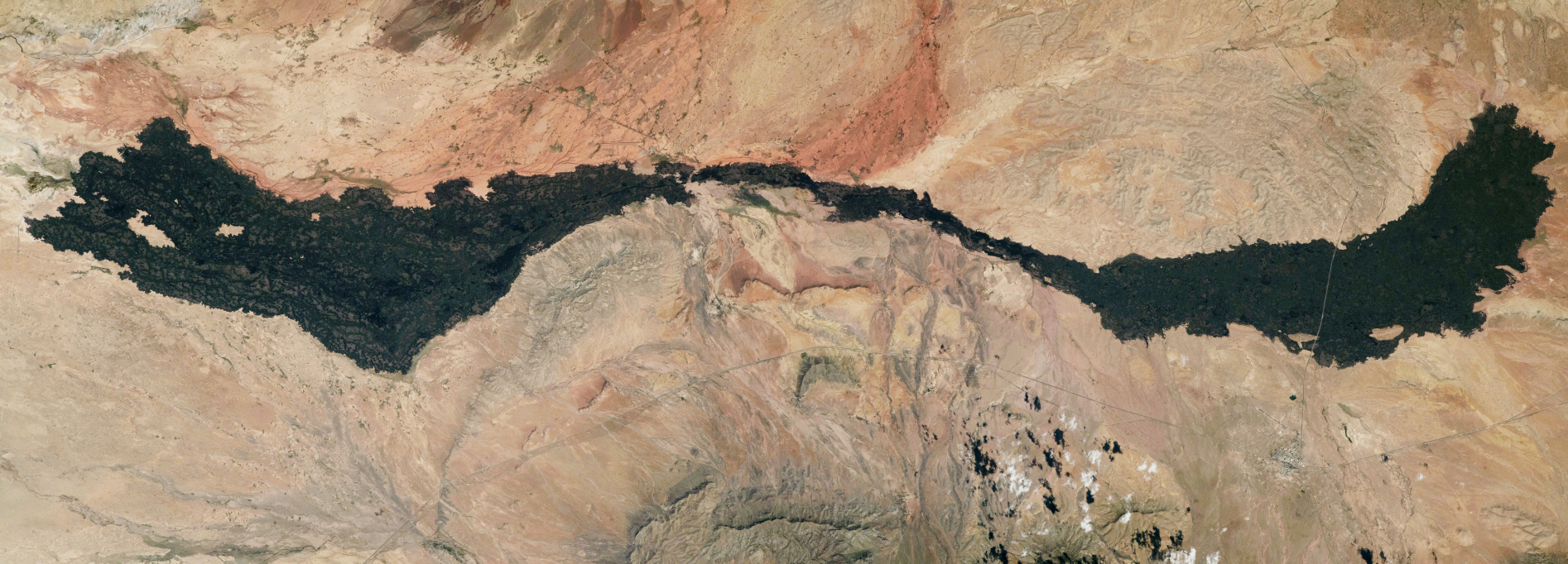Fotografija toka lave Carrizozo Malpaís u pustinji Chihuahuan, Novi Meksiko, koju je snimio neimenovani astronaut s Međunarodne svemirske stanice 30. lipnja (©NASA Earth Observatory).