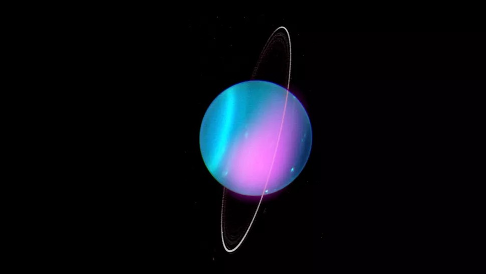 Uran i njegovi prstenovi 'okrenuti sz na bok' u odnosu na Sunce (©NASA/CXO/University College London/W. Dunn et al/W.M. Keck Observatory).