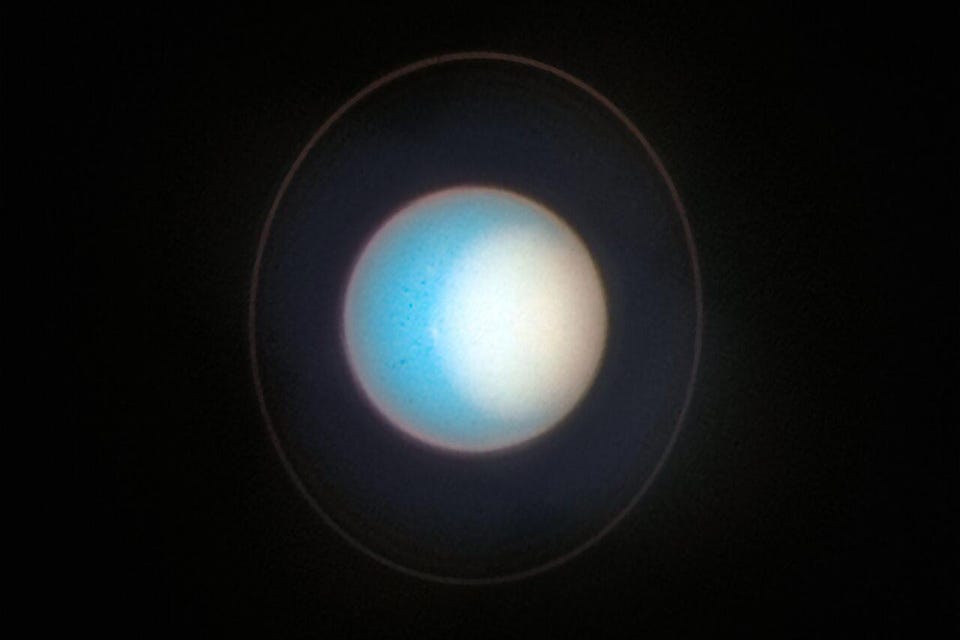 Fotografija Urana. Fotografija Juptiera i Ganymede. Zasluge: NASA, ESA, STSCI, A. SIMON (NASA).