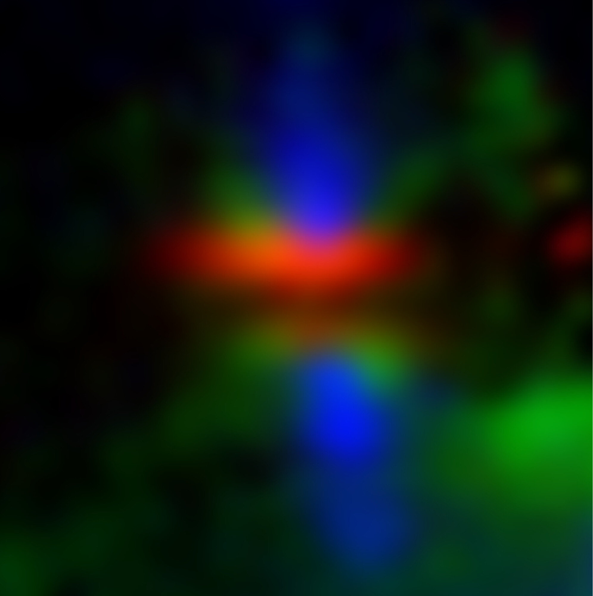 Kompozitna slika područja oko protoplanetarnog diska HH 48 NE. Raspršeno svjetlo na disku je crveno. Plin iz vjetra iznad diska je zelen. Mlaz je plav. Autori HST, JWST, Sturm i sur.