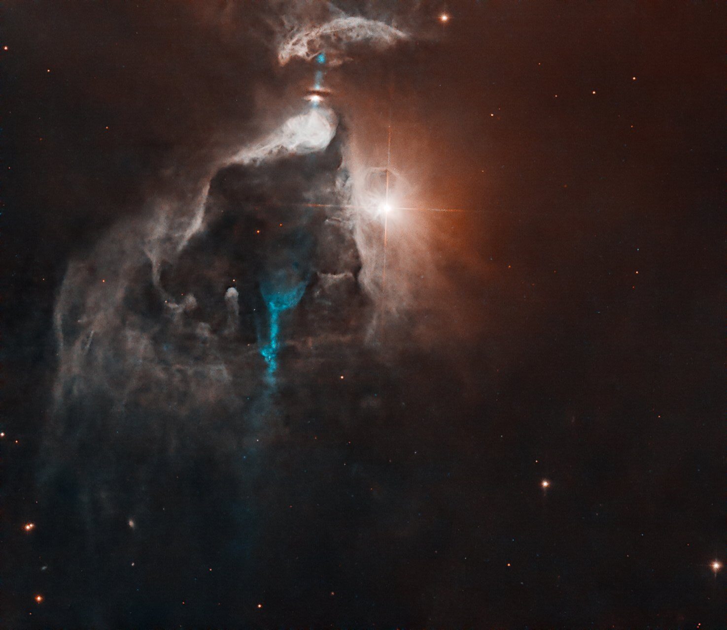 Mlazovi proizlaze iz omotače novonastajuće zvijezde, probijajući se kroz svemir i sijecajući kroz plin i prašinu sjajne maglice, na ovoj novoj slici NASA-e.