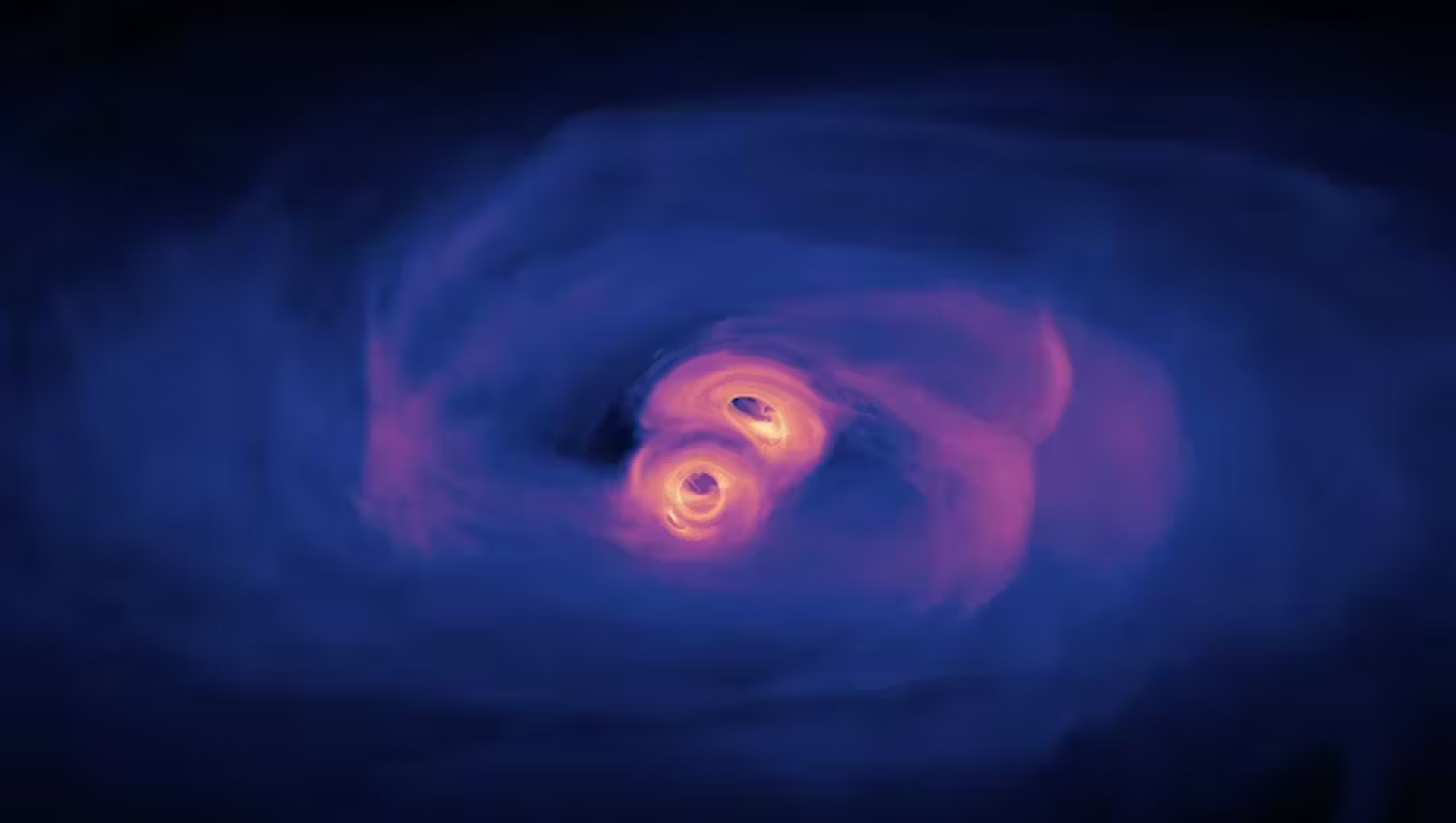 Ilustracija spajanja dviju supermasivnih crnih rupa. (Zasluge za sliku: Scott Noble, NASA GSFC).
