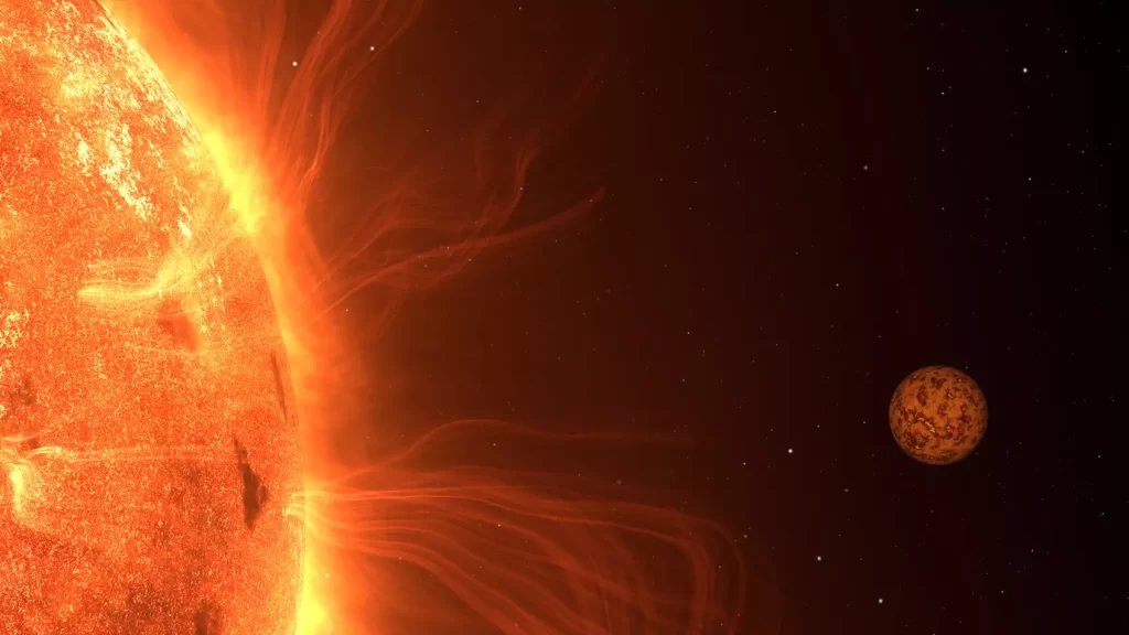Umjetnička interpretacija planeta Trappist-1 b neposredno prije nego što nestane iza svoje matične zvijezde, hladnog crvenog patuljka Trappist-1. Ove zvijezde poznate su po intenzivnoj aktivnosti, uključujući velike zvjezdane pjege i snažne erupcije. Sam Trappist-1 b mogao bi doživljavati ekstremni vulkanizam zbog tih uvjeta. © Thomas Müller (HdA/MPIA)