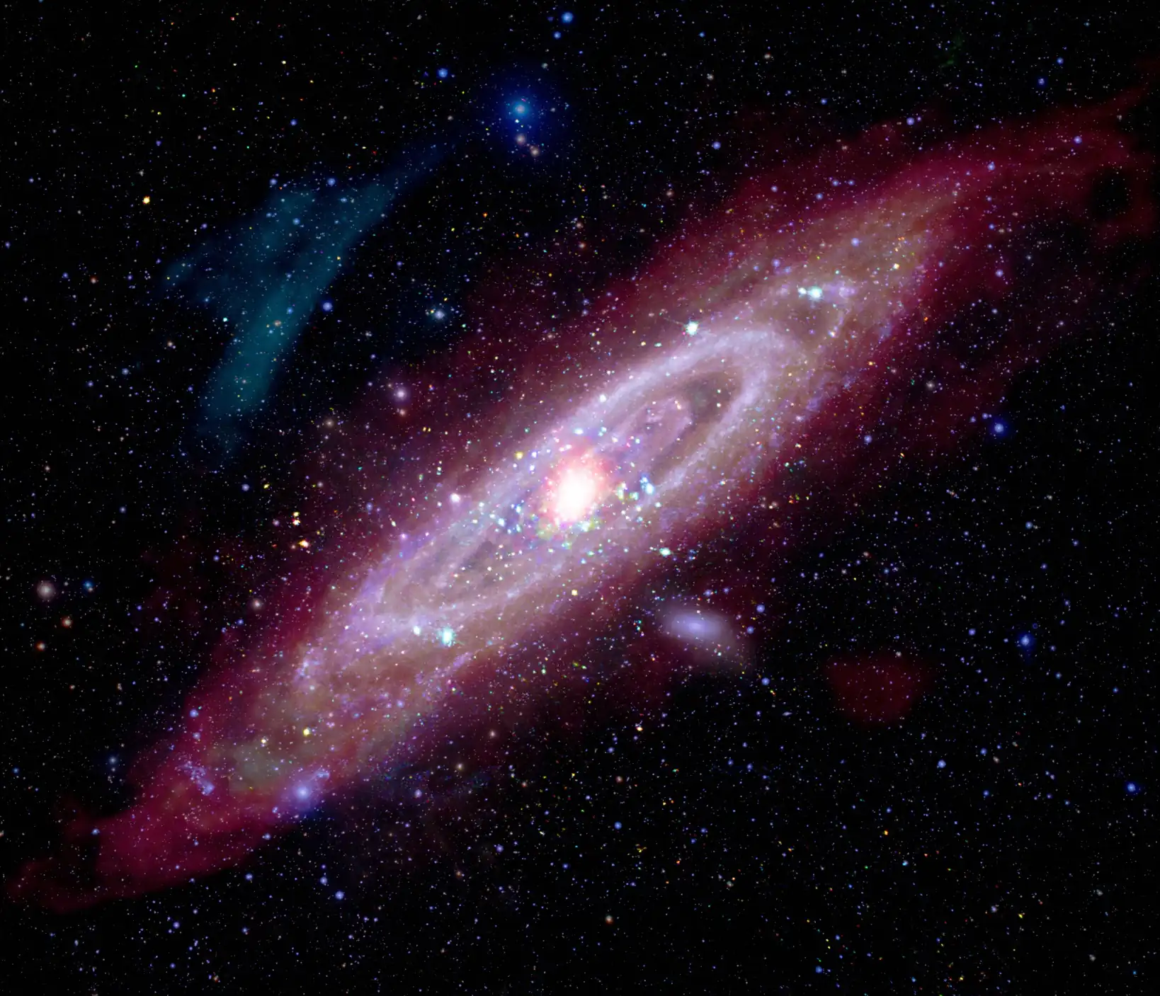 Galaktika Andromeda. Zasluge: Rendgenske zrake: NASA/CXO/UMass/Z. Li i Q.D. Wang, ESA/XMM-Newton Infracrveno: NASA/JPL-Caltech/WISE, Spitzer, NASA/JPL-Caltech/K. Gordon (Sveučilište Arizona), ESA/Herschel, ESA/Planck, NASA/IRAS, NASA/COBE Radio: NSF/GBT/WSRT/IRAM/C. Clark (STScI) Ultraljubičasto: NASA/JPL-Caltech/GALEX Optičko: Andromeda, Unexpected © Marcel Drechsler, Xavier Strottner, Yann Sainty i J. Sahner, T. Kottary Obrada kompozitne slike: L. Frattare, K. Arcand, J. Major.