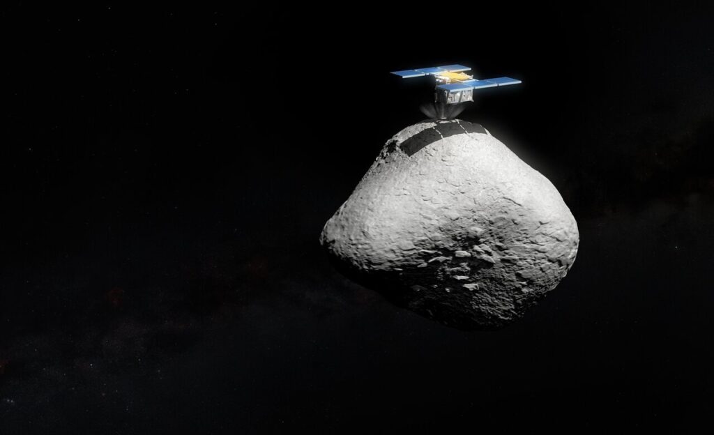 Umjetnička ilustracija japanske svemirske misije Hayabusa2 pri dodiru površine asteroida 1998 KY26. Nova opažanja pomoću Vrlo velikog teleskopa (VLT) Europskog južnog opservatorija pokazala su da asteroid 1998 KY26 ima promjer od samo 11 metara, gotovo tri puta manji od ranijih procjena, te da se oko svoje osi okrene jednom u pet minuta – znatno brže nego što se očekivalo. Na slici je prikazana ažurirana usporedba veličine između asteroida i letjelice. Izvor: ESO/M. Kornmesser. Asteroid: T. Santana-Ros i sur. Model Hayabusa2: SuperTKG (CC-BY-SA).