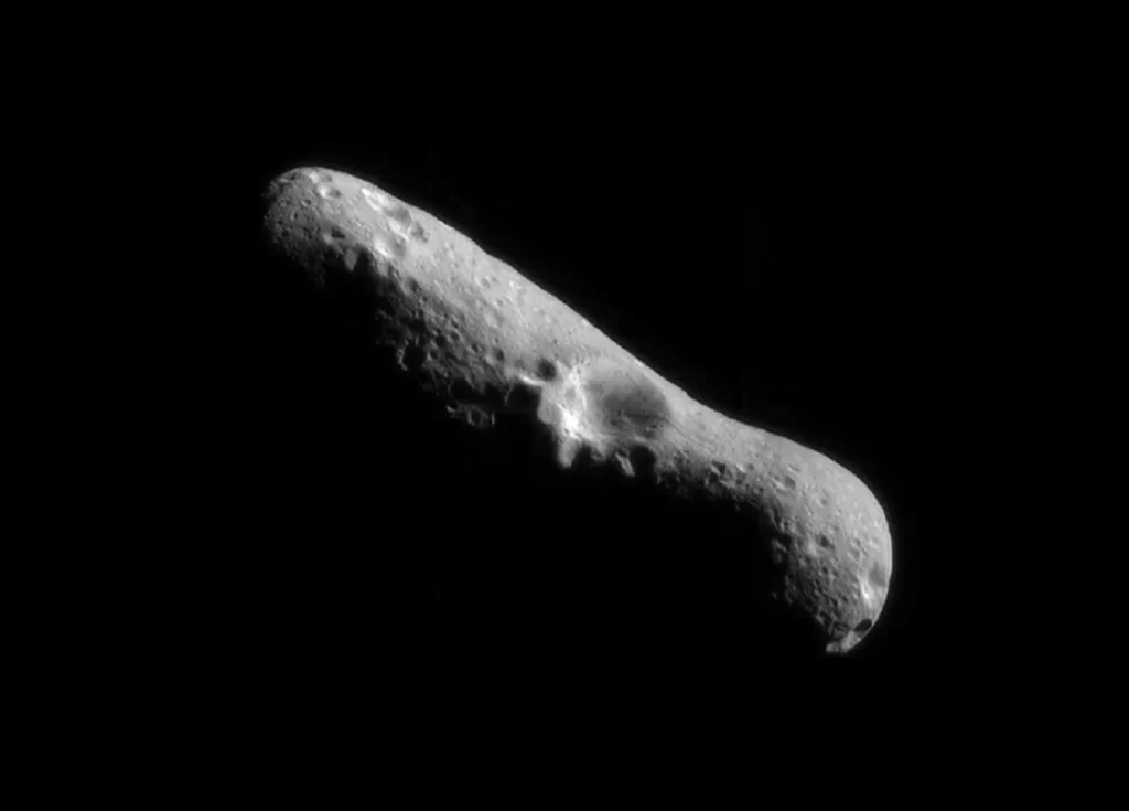 Eros ima nepravilni, izdužen oblik sličan kikirikiju, dimenzija oko 34 × 11 × 11 kilometara. Izvor: NASA