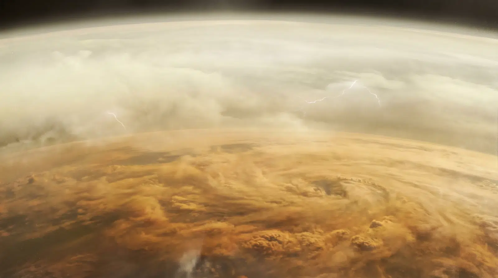 Godinama je jedan sloj sitnih čestica u atmosferi Venere ostajao bez uvjerljivog objašnjenja. Nalazi se ispod glavnog sloja oblaka, na visinama nižima od područja između oko 47 i 70 kilometara, a prvi put je zabilježen još 1970-ih tijekom ranih misija. Novo istraživanje sada pokazuje da njegovo podrijetlo vjerojatno ne treba tražiti u samoj Veneri, nego u materijalu koji na planet stiže iz svemira. Prema modelu tima sa Sveučilišta Tohoku i Kraljevskog belgijskog instituta za aeronomiju svemira, taj sloj nastaje od kozmičke prašine koju stvaraju meteori pri ulasku u atmosferu. U višim dijelovima atmosfere ta se prašina raspada u mineralne čestice veličine svega nekoliko nanometara. One se potom ugrađuju u guste oblake sumporne kiseline koji dominiraju Venerinom atmosferom. Kako postupno tonu u toplije slojeve, sumporna kiselina isparava, a iza nje ostaju čvrste mineralne jezgre. Te se jezgre zatim sudaraju i lijepe jedna za drugu, stvarajući stabilan sloj čestica kakav su još prije desetljeća zabilježile sonde Venera i Pioneer Venus. Istraživači ističu da se rezultati njihova modela dobro podudaraju s tadašnjim mjerenjima. Takve čestice pritom ne tvore samo jedan atmosferski sloj, nego utječu i na širu klimu Venere. Prema istraživanju, djeluju kao jezgre kondenzacije i povećavaju količinu oblaka za procijenjenih 20 do 30 posto. Uz to, metalni sastojci u kozmičkoj prašini, osobito željezo, mogli bi objasniti i tvar koja snažno upija ultraljubičasto zračenje i utječe na energetsku ravnotežu planeta. Ako se ovo tumačenje potvrdi, isti proces mogao bi biti važan i u atmosferama drugih planeta, uključujući plinovite divove i egzoplanete, a buduće misije poput NASA-ine sonde DAVINCI trebale bi dati prve izravne provjere.