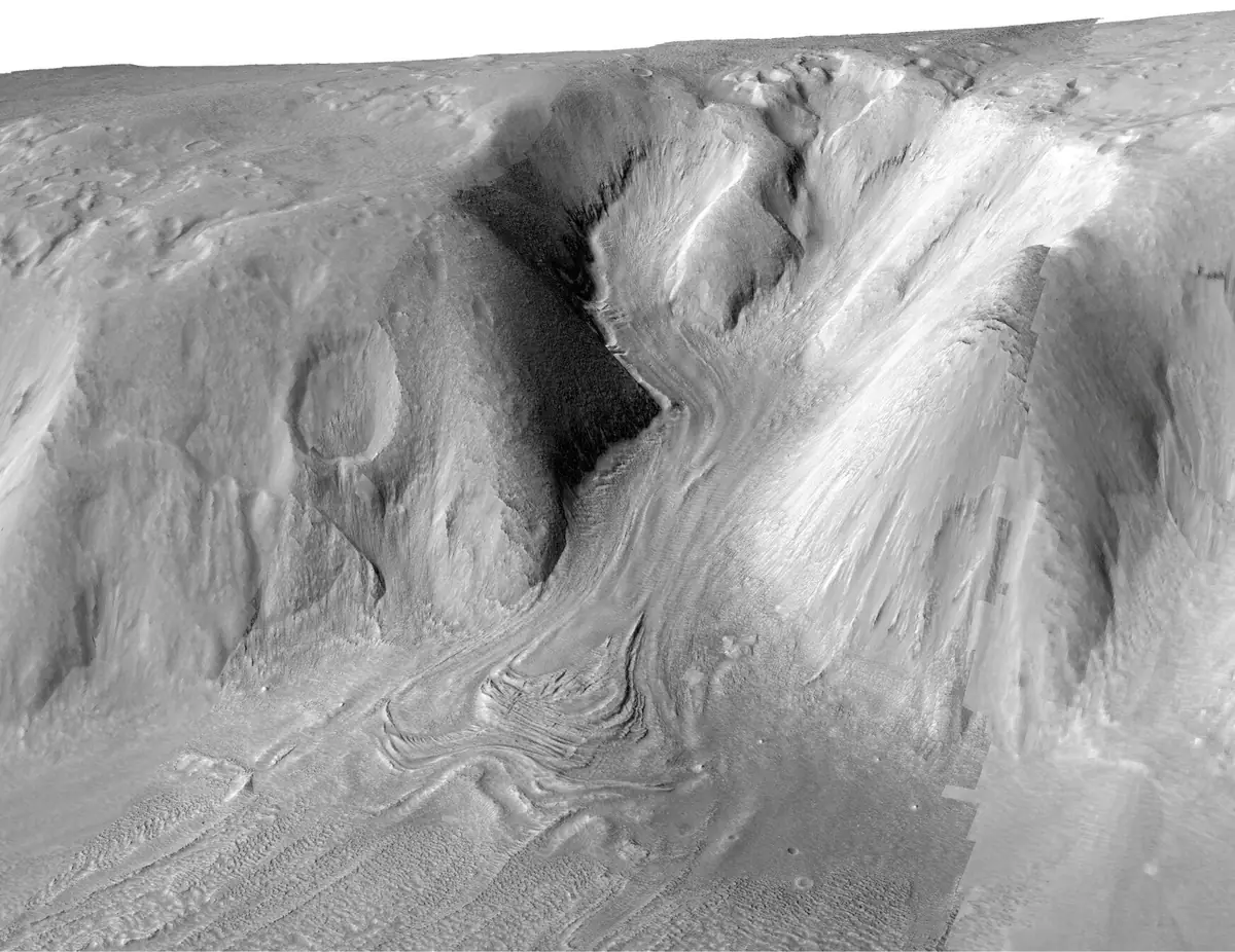 Ova stereo snimka koju je napravila kamera HiRISE, pod vodstvom Sveučilišta u Arizoni, na NASA-inom orbiteru Mars Reconnaissance Orbiter, prikazuje strukturu viskoznog toka u području Deuteronilus Mensae na Marsu, za koje se smatra da sadrži velike količine leda. Zasluge: HiRISE/CTX