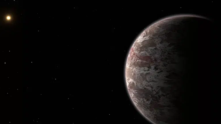 Umjetnički prikaz planeta Epsilon Indi Ab, s oblacima vode iznad atmosfere u kojoj prevladava amonijak. Zasluge: E. C. Matthews, MPIA / T. Müller, HdA