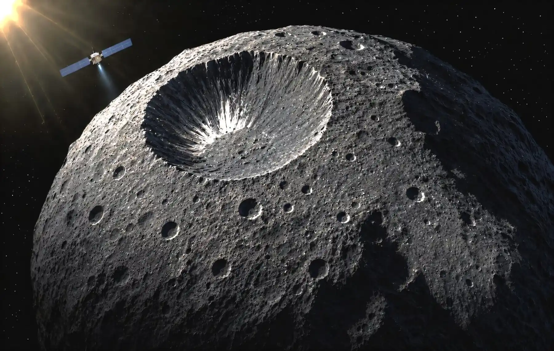 Umjetnički prikaz NASA-ine letjelice Dawn iznad kraterirane površine asteroida Veste. Credit: Institut de physique du globe de Paris