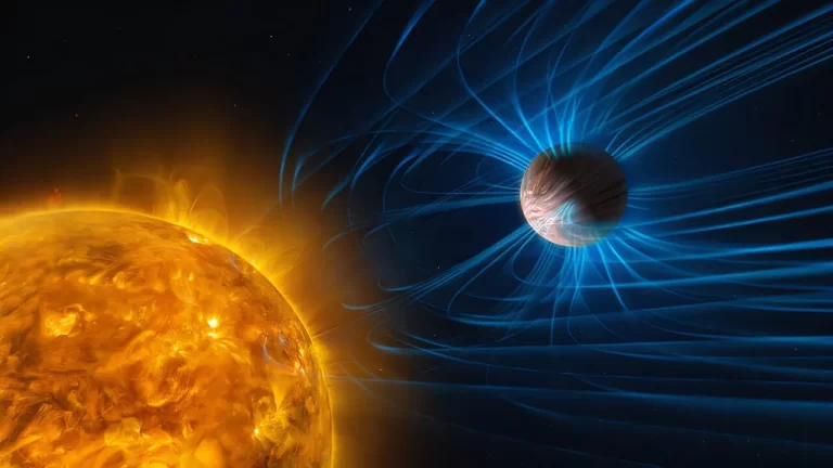 Ilustracija vrućeg egzoplaneta nalik Jupiteru blizu matične zvijezde, s plavim linijama magnetskog polja koje okružuju planet.