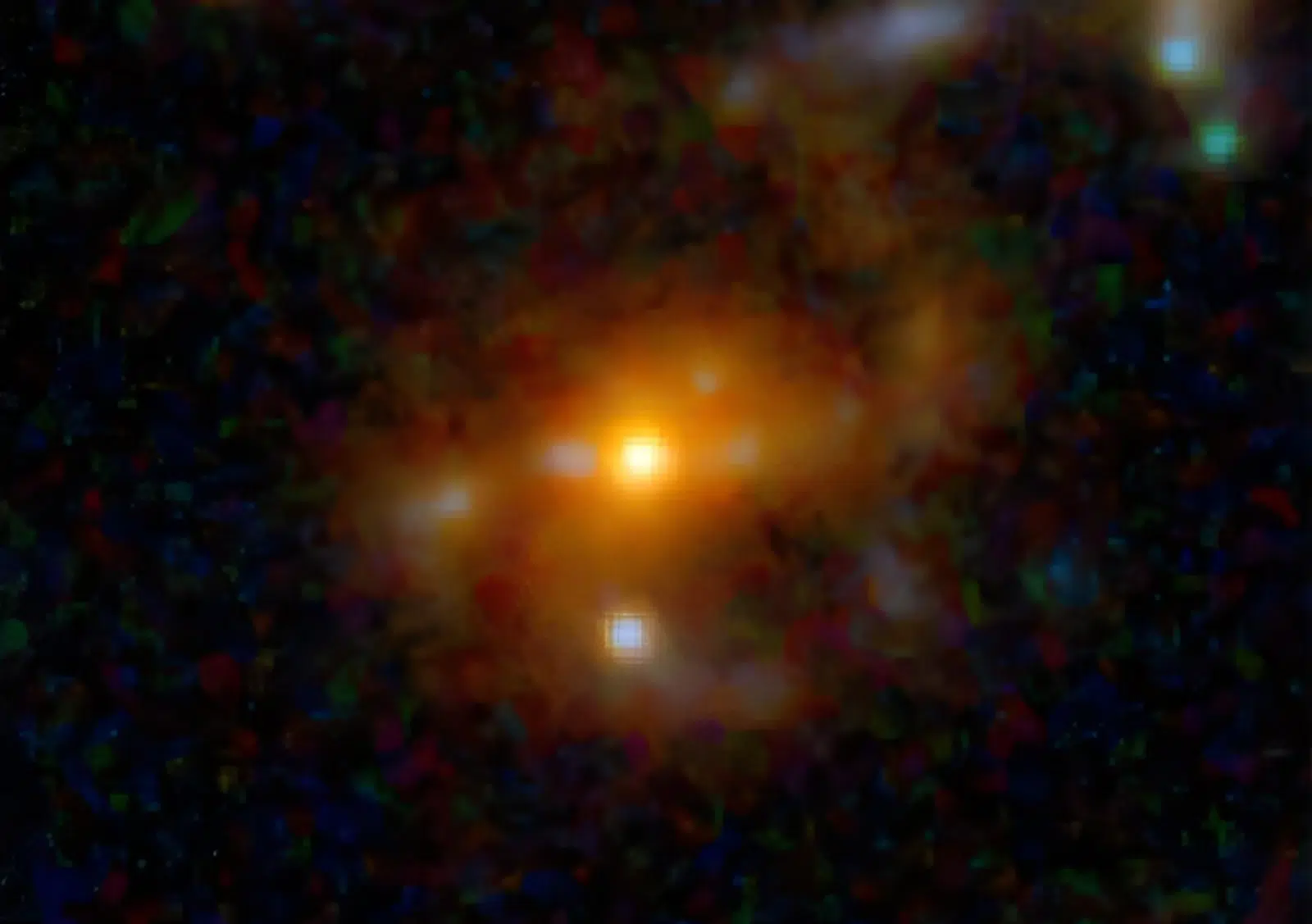 Kompozitna lažno obojena JWST snimka galaksije M1149-BSG-z5 s jarko narančastim središtem i difuznim okolnim sjajem na tamnoj pozadini.